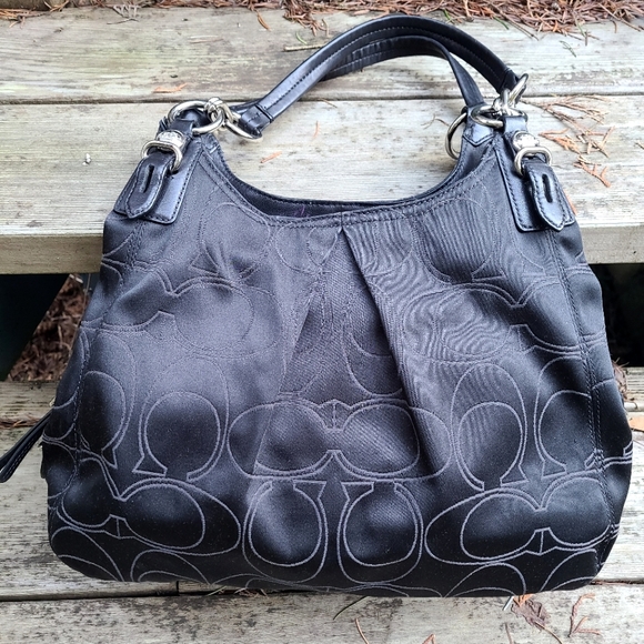 coach purse with purple lining